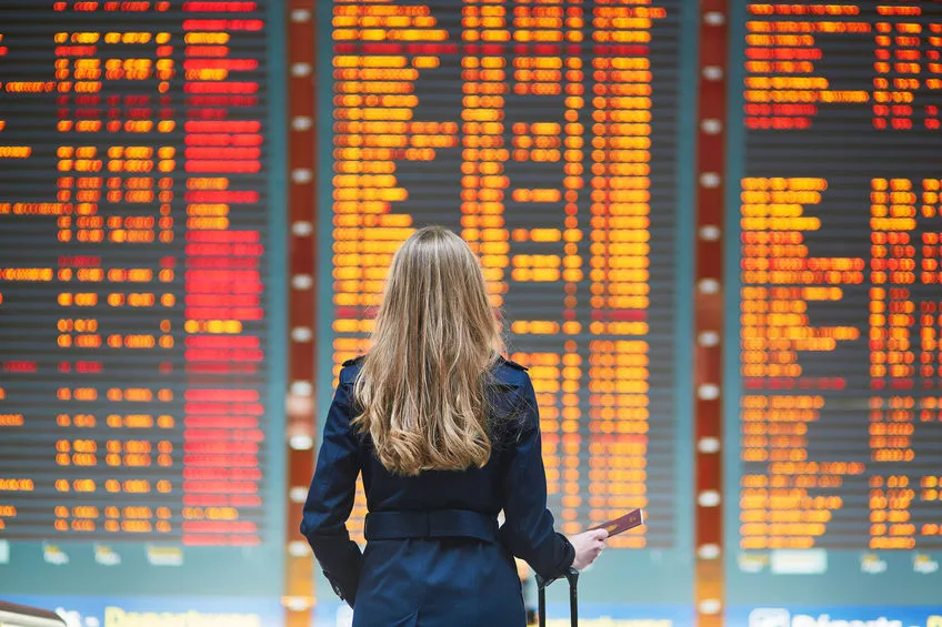 young female traveler in international airport